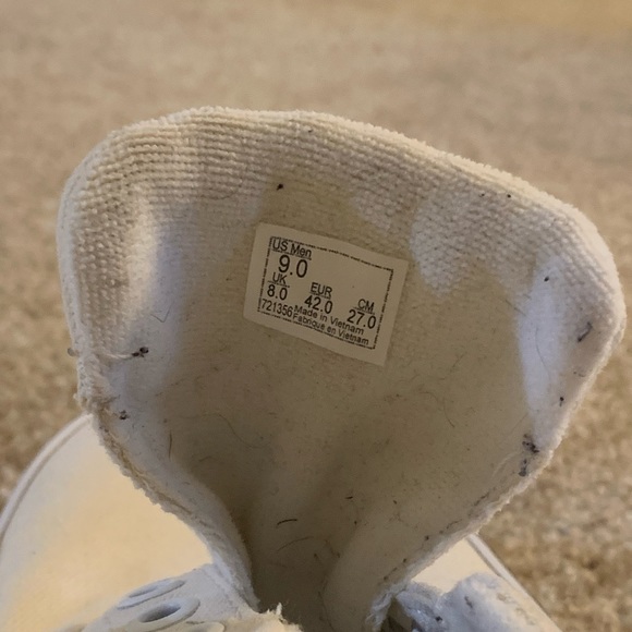 All white Vans with navy blue trim. - Picture 6 of 7